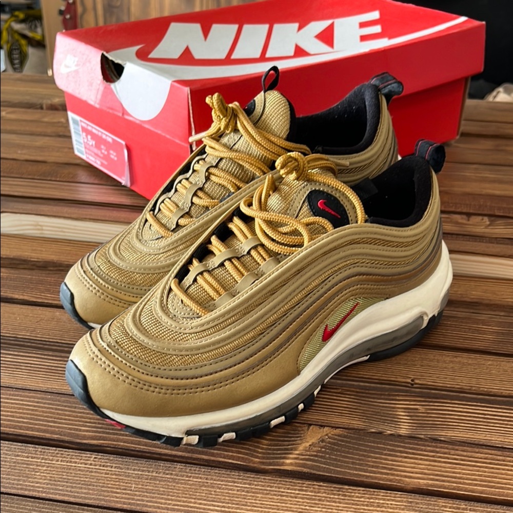 Nike Gold and Black Sneakers with Air Max Cushioning